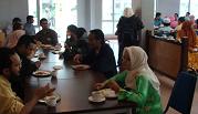 Participant networking during the short 20 min break at the lounge.