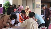 The morning queue in registration for the IT Security Seminar